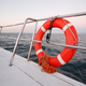 Life saving buoy on a boat at sea